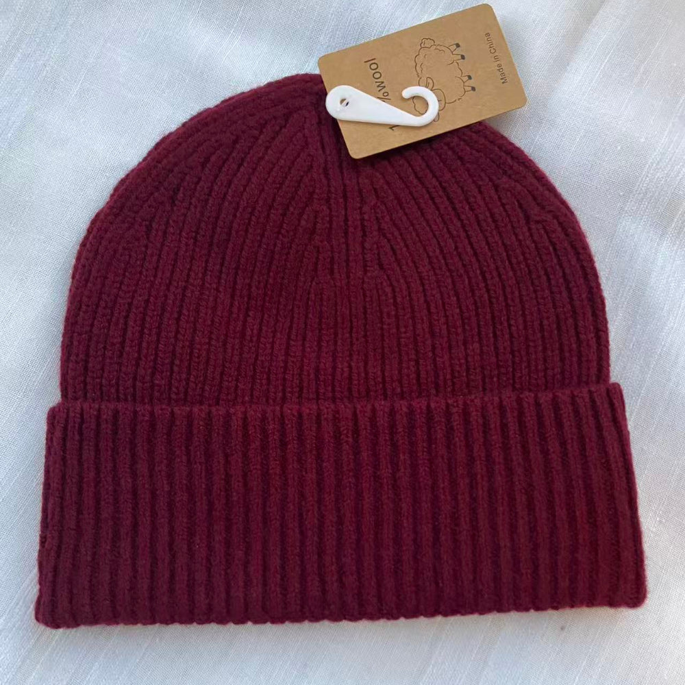 Unisex enfärgad  vinter ullmössa för dam och herr i 100% ren ull - ingen logotyp