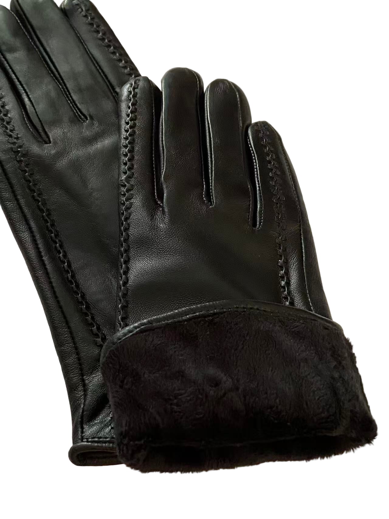 Svarta damhandskar i lammskinn med dekorativa linjer och rosett.